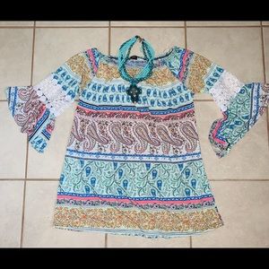 Win Win Pinwheel sleeve Tunic
